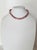 Indulge in the timeless beauty of this exquisite dark pink metallic shade Edison pearl necklace. Measuring 17.5 inches...