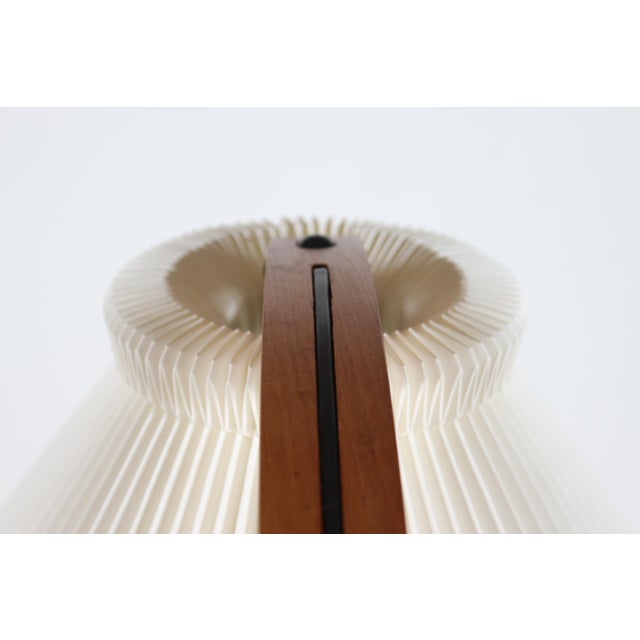 Original vintage floor lamp designed by Mads Caprani manufactured in Denmark by Caprani Light AS in the 1970s. The stem is...