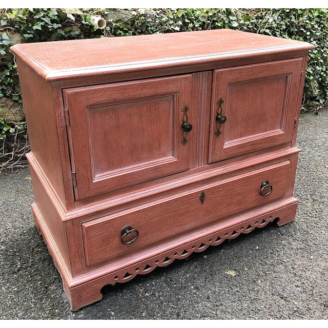 Great little cabinet by Drexel from the Country Diary Collection. Original salmon paint decorated crackled finish. Two...