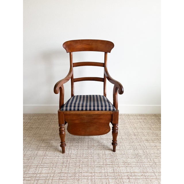 A true English antique, this solid wood armchair is a unique and beautiful piece of history. With a lovely plaid...