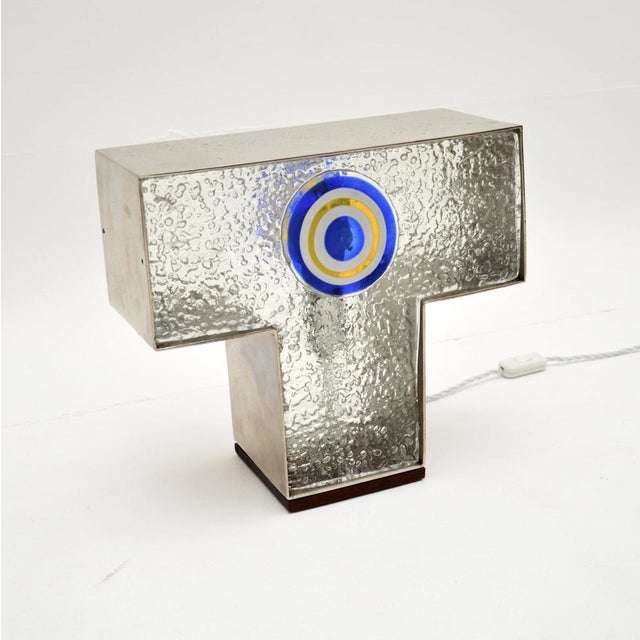 A stylish and quirky vintage italian glass and steel table lamp, thought to be designed by angelo brotto for esperia...
