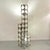 Modular Floor Lamp in Brushed and Polished Stainless Steel from Reggiani, Italy, 1970s, in Very Good conditions. Designed...