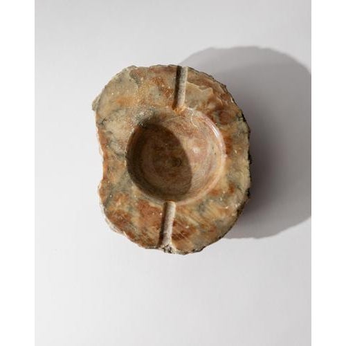 This vintage 1960s alabaster ashtray is a beautifully hand-carved Italian stone piece with a raw, textured sculptural...