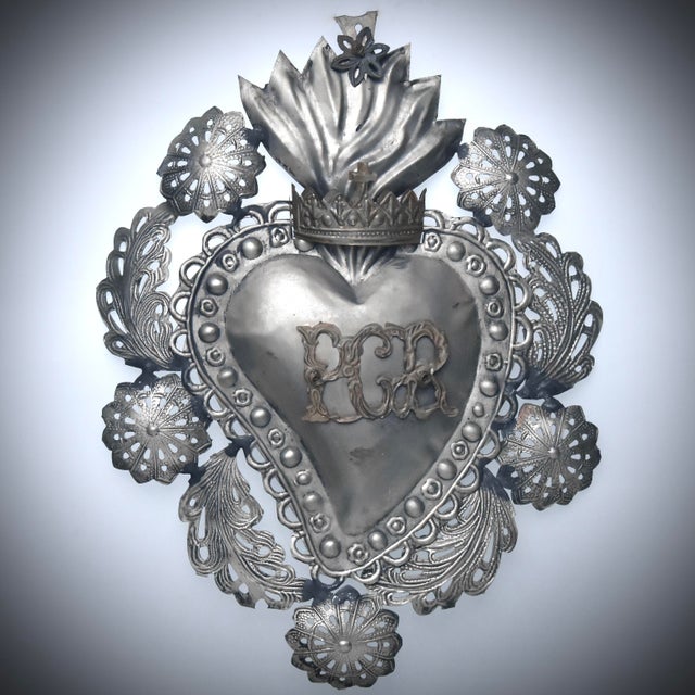 An antique Italian Ex-voto heart, this type of decorative ornate metal hearts dates back to the mid to late 19th century,...