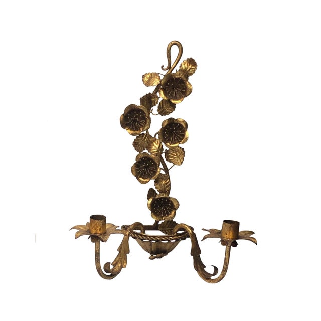 A pair of mid century tole gilt Anemone flowers sconces from Italy.