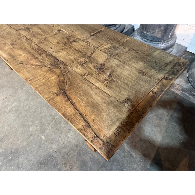 A good Solid Oak Dining Table having lots of character and nice carved side rails. Dating to the early 1900s and of good...