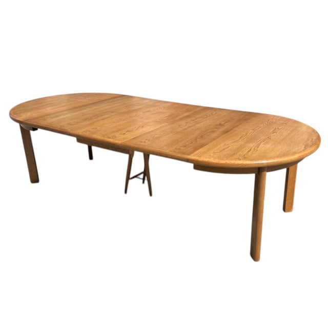 Elevate your dining space with this exquisite 1960s Danish Modern oval dining table, a timeless example of Scandinavian...