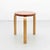 Stool designed by Alvar Aalto from 1960. Manufactured by Artek (Finland). It features new leather top, wood legs and...