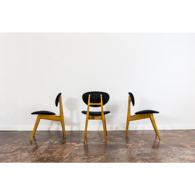A set of three GFM-22 chairs, model 200/128, designed by Juliusz Kędziorek and produced by Gościcińska Furniture Factory...