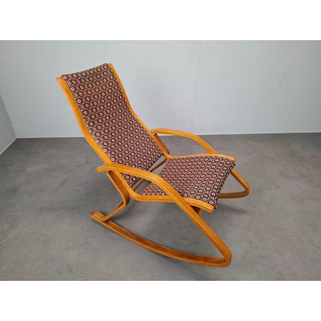 This rare Art Deco rocking chair was produced in Czechoslovakia during the 1930s. Crafted from bentwood with elegantly...