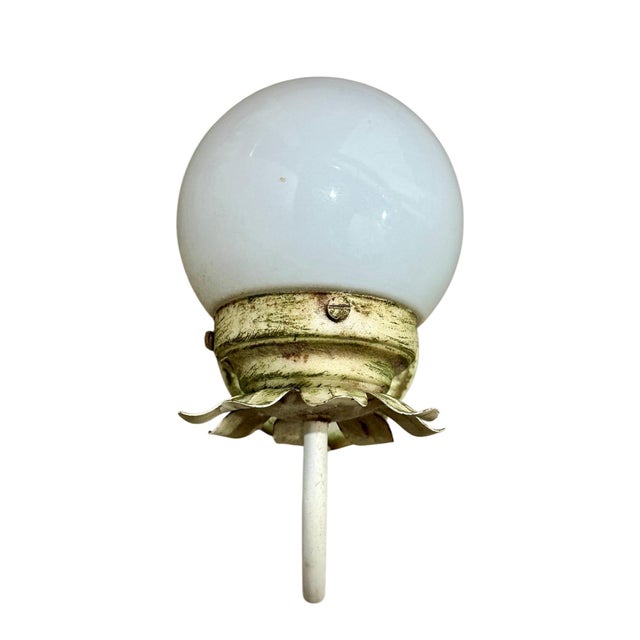 Good vintage condition Add a touch of timeless charm and vintage character to your home with this delightful wall sconce....