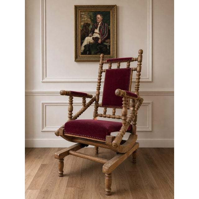 A striking Danish oak highback platform rocking chair, circa 1970s, in the manner of Henning Kjærnulf. The chair features...