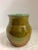 Vintage polished Carmel color ceramic vase with an aqua green interior.