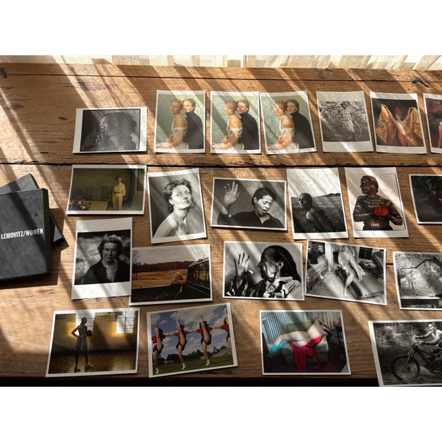 Annie Leibovitz Women postcard collection presented in its original black box. The set features photographic images from...