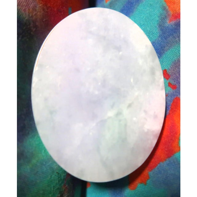 This is a well-cut dragon paperweight of natural jade in a green and lavender coloration, in high relief. It is a very...
