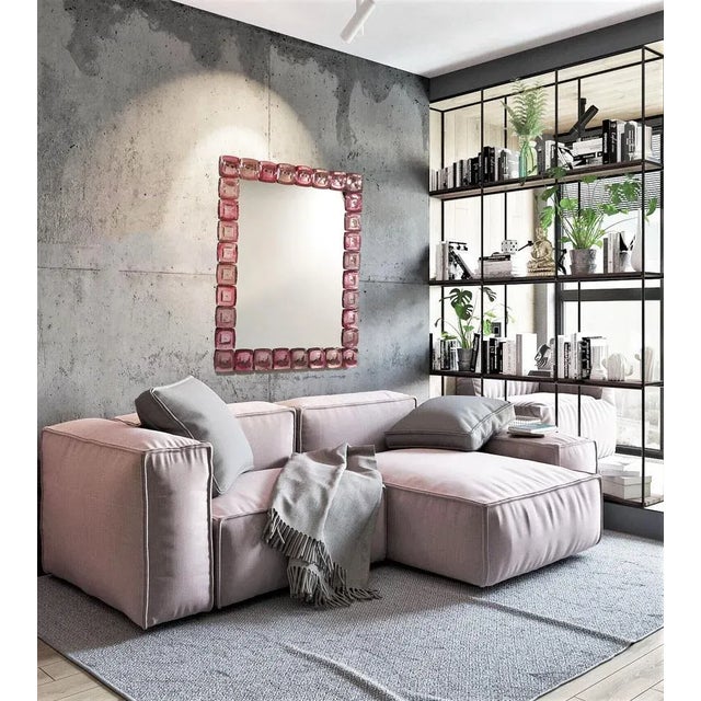 "Ruby" Murano glass mirror in the contemporary style of the "Dischi" series. The frame consists of 32 pieces of massive...