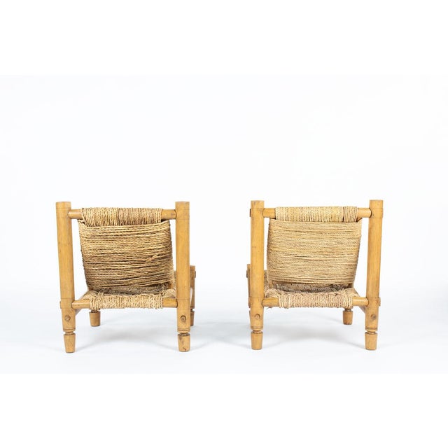 This pair of lounge chairs was designed by the French design duo Adrien Audoux and Frida Minet in the 1950s and produced...