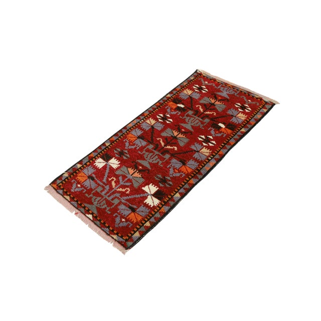 Vintage Handknotted decorative mini rug from Kars region of Turkey. Approximately 45-55 years old. In very good condition.