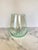 Hand-blown glass vase in a soft, pale turquoise-green hue with a gently tapered, teardrop silhouette — wider at the...
