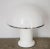A 1970s white acrylic glass desk lamp by Groupe Habitat, France. This piece is attributed to the mentioned designer/maker....