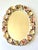 Bring a little piece of the shore indoors with this charming vintage oval mirror, its frame lovingly handcrafted from...