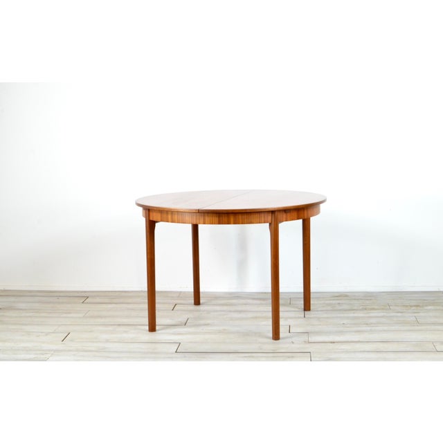 Mid-Century Extendable Teak Dining Table from McIntosh, 1960s, in Very Good conditions. Designed 1960 to 1969 I have...