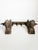 Pair of andirons with female heads, France, 1960s, with a distinctive decorative charm and classical inspiration. These...