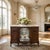 A beautifully romantic late 19th century French walnut display buffet, created to bring elegance, artistry, and graceful...