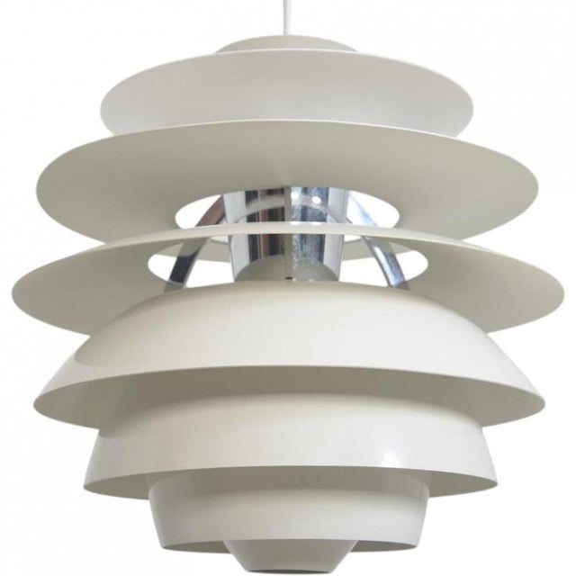 Poul Henningsen Snowball lamp with white metal shades. The lamp is from the 2000s and appears in good condition with a...