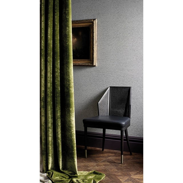 A lustrous semi-plain velvet cotton-blend fabric woven with two viscose yarns in the pile to create an uneven yet elegant...