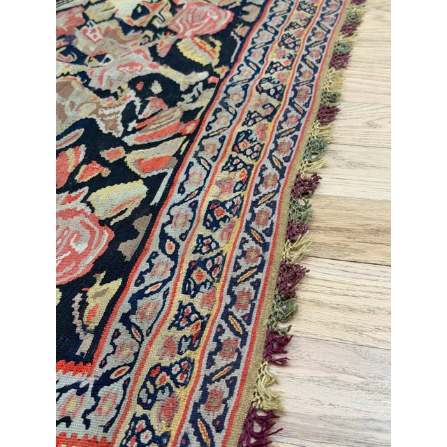 This is an authentic Persian Senneh rug from around 1900, woven in the Kurdish city of Sanandaj (historically called...