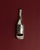This vintage silver-plated bottle opener from the 1970s features a charming bottle-shaped design, combining playful retro...