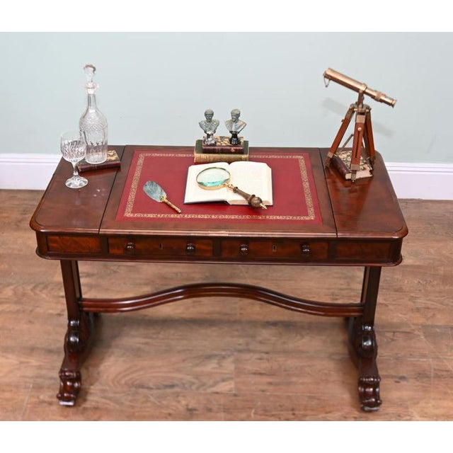Fine Victorian mahogany writing desk dating to circa 1880 The rectangular top features an inset red leather writing...