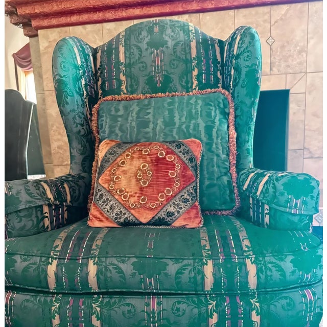 Add classic sophistication to your interior with this vintage 1990s Ethan Allen "Sussex" style wingback chair, curated by...
