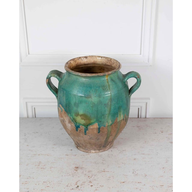 Finished in a turquoise and green glaze, this French confit pot was made around 1840 and represents a rarer variant of the...