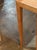 This set of vintage Danish oak nesting tables exudes mid 20th-century charm with its original design and warm brown color....