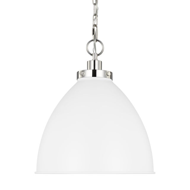 Inspired by various classic utility silhouettes - from factory lighting to barn sconces - capped by contrasting metal...