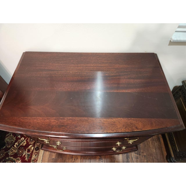 Fabulous vintage mahogany or cherry wood bow front bachelor's 3 draw chest. Chippendale style. Looks very much like a...