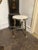 The Vintage French Maison Jansen Steel Side Table is a stylish and elegant piece of furniture that adds a touch of...