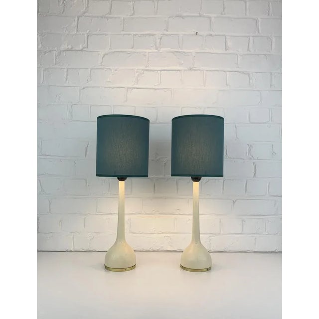Table lamps model B44 designed in the 1960s by Hans-Agne Jakobsson. Manufactured by Markaryd in Sweden. Lamp-base made of...