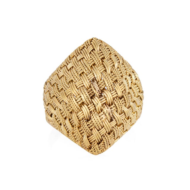 Stylish vintage woven dome cocktail ring (circa 1960s) crafted in 18 karat yellow gold. With a tightly woven rope design...