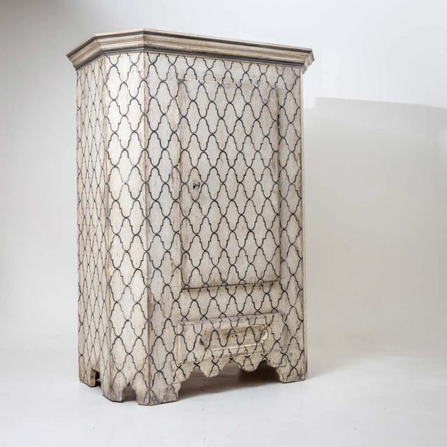 Painted one-door cabinet with beveled corners and new painting based on historical models. The painting was then given an...