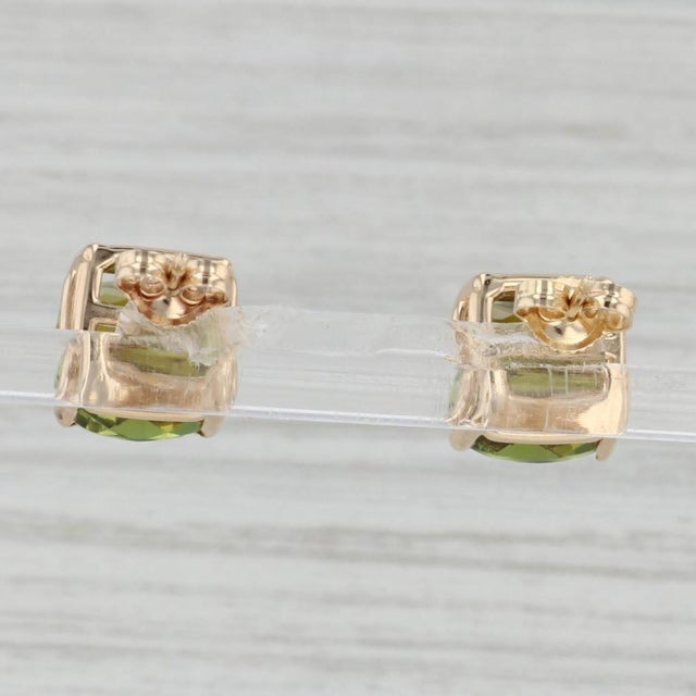 Gemstone Information: - Natural Tourmaline - Total Carats - 8.20ctw Cut - Cushion Checkerboard Color - Green Metal: 14k...