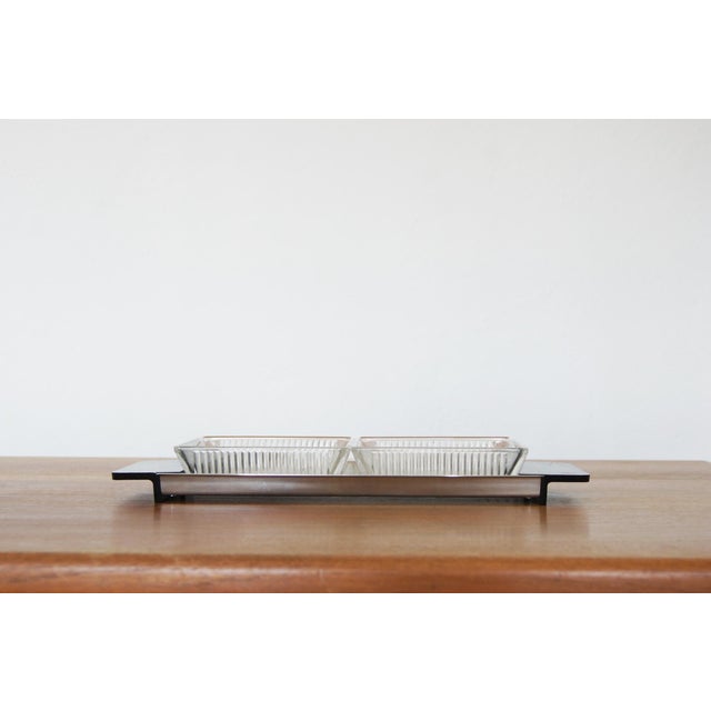 Set of crystal bowls and tray made of stainless steel. Manufactured in Germany in the 1960s by WMF . Square bowls with...