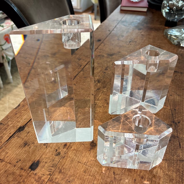 Fabulous set of 3 acrylic candlesticks. The tallest is 8” high, the middle is 5” and the smallest is 3”. Note that candles...