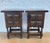 Pair of Spanish rustic-style wooden nightstands dating to the mid-20th century. Each piece features two drawers with...