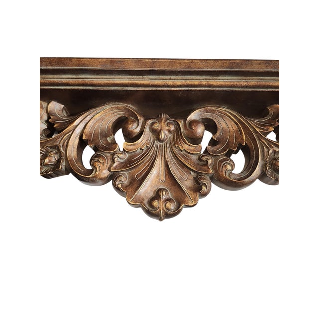 Beautiful gilt Baroque style wooden wall shelf in excellent condition. Acanthus leaf motif, nice deep shelf for multi-...