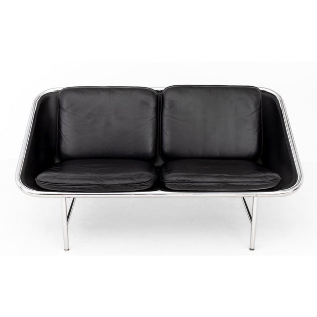 George Nelson (American, 1908-1986) and Associates "Sling" Sofa, Model 6381, with black leather cushions on chrome-plated...