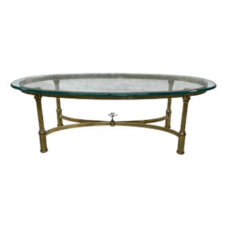 Vintage Jansen Style Oval Brass and Glass Coffee Table, Armillary Finial For Sale