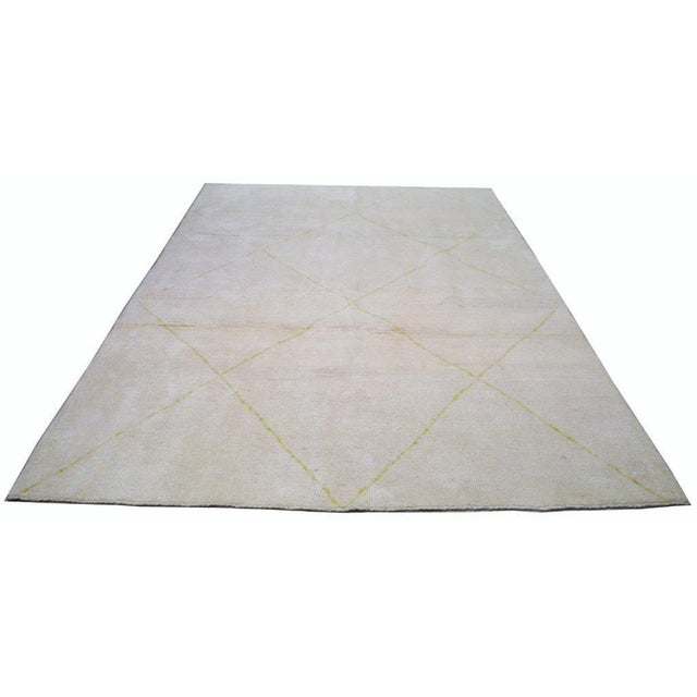 Moroccan Beni Ourain hand knotted rug with natural colors, contemporary style and soft texture.